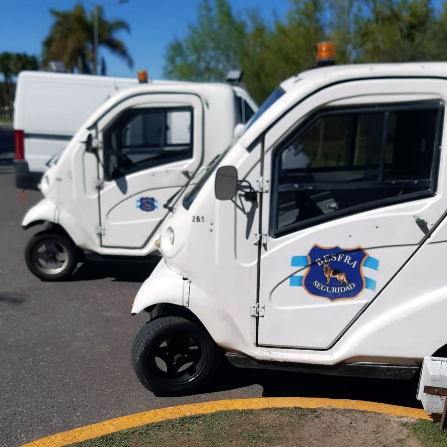young man side profile having beard trimmed with scissors